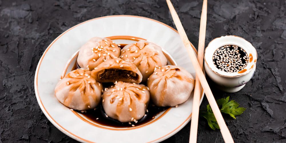Dumplings to eat Bowl of dumplings ready to eat with proper dining etiquette