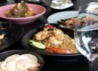 A table of premium Asian takeaway dishes including prawn fried rice from My Bella Asian, a local Bella Vista restaurant